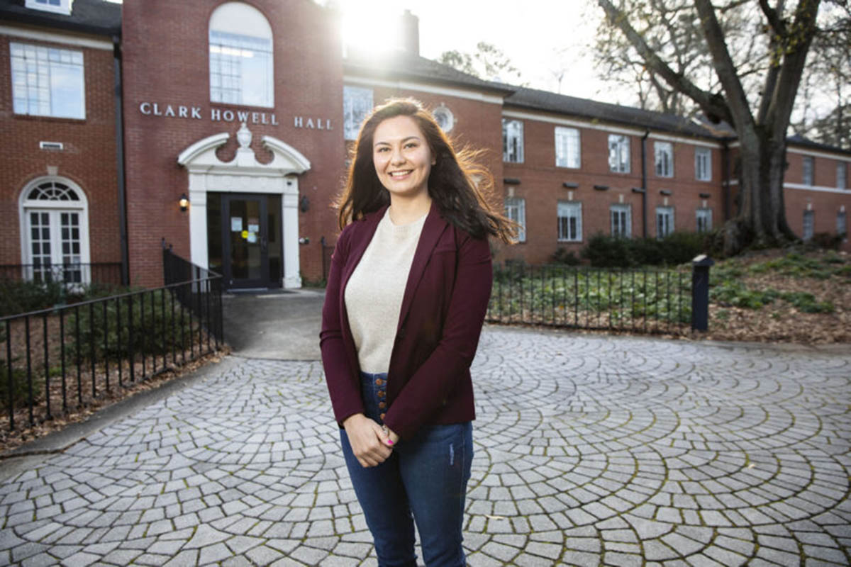 Destiny Loyd in front of Howell Hall on UGA Campus